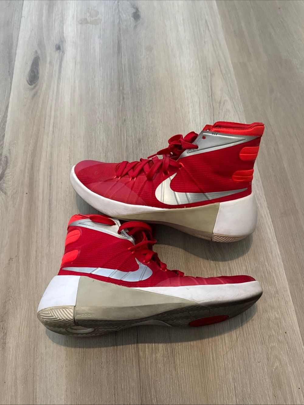 Nike Red and White High-Top Basketball Sneakers with Silver Swoosh